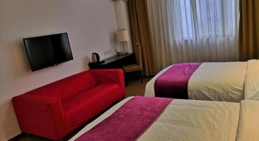 Super 8 Hotel Beijing New National Exhibition Yumin Street Exterior foto